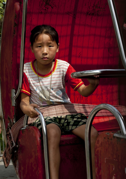 North Korean girl in an old attraction in Taesongsan funfair, Pyongan Province, Pyongyang, North Korea