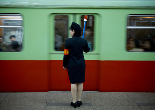 North Korean control woman in the subway, Pyongan Province, Pyongyang, North Korea