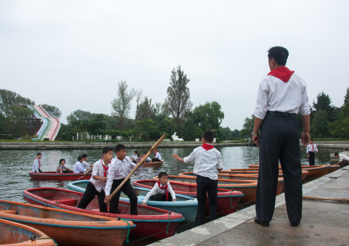 North Korean pioneers boys in boats in Songdowon international children's camp, Kangwon Province, Wonsan, North Korea