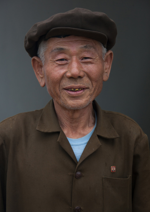 Portrait of North Korean smiling farming hero, South Hamgyong Province, Hamhung, North Korea