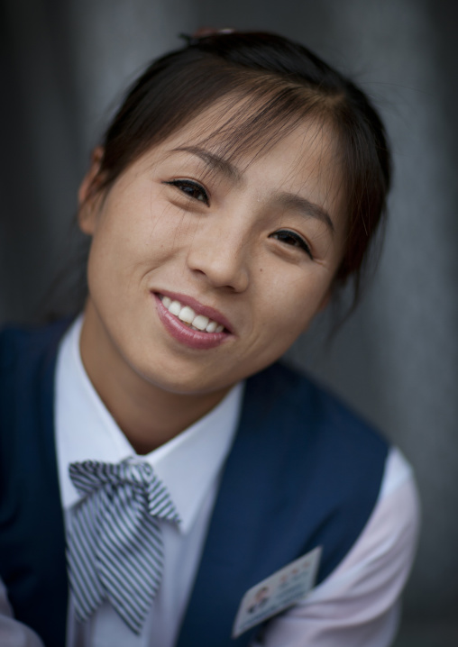 Portrait of a North Korean young woman smiling, North Hamgyong Province, Jung Pyong Ri, North Korea
