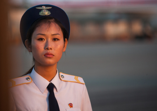 Cute North Korean airport employee, Pyongan Province, Pyongyang, North Korea