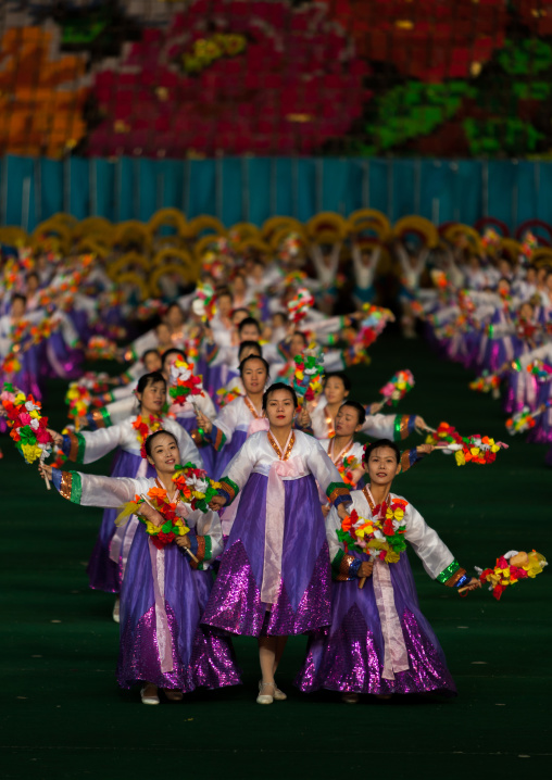 North Korean women dancing in choson-ot during the Arirang mass games in may day stadium, Pyongan Province, Pyongyang, North Korea