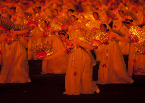 North Korean women dancing in choson-ot during the Arirang mass games in may day stadium, Pyongan Province, Pyongyang, North Korea