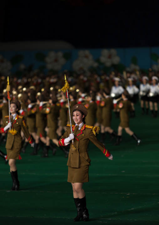 Sexy North Korean women dressed as soldiers dancing with swords during the Arirang mass games in may day stadium, Pyongan Province, Pyongyang, North Korea