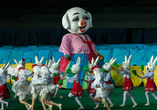 North Korean children performing with a giant pig during the Arirang mass games in may day stadium, Pyongan Province, Pyongyang, North Korea