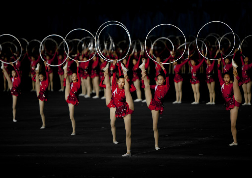 North Korean gymnasts performing with hoops at Arirang mass games in may day stadium, Pyongan Province, Pyongyang, North Korea