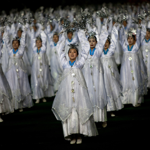 North Korean women dancing in choson-ot during the Arirang mass games in may day stadium, Pyongan Province, Pyongyang, North Korea