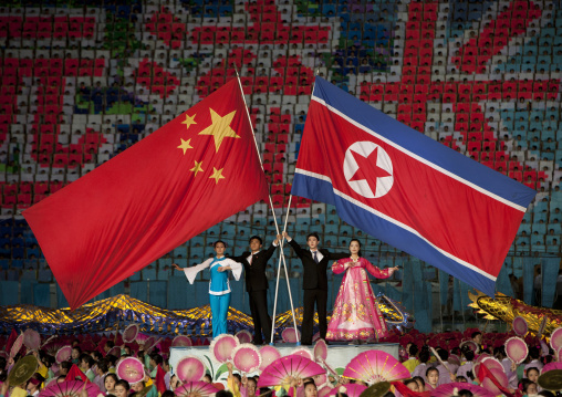 North Korea and china flags during the Arirang mass games in may day stadium, Pyongan Province, Pyongyang, North Korea