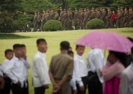 North Korean people watching soldiers coming at Kim il Sung Mangyongdae native house, Pyongan Province, Pyongyang, North Korea