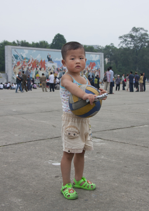 North Korea boy holding a basket ball, Pyongan Province, Pyongyang, North Korea