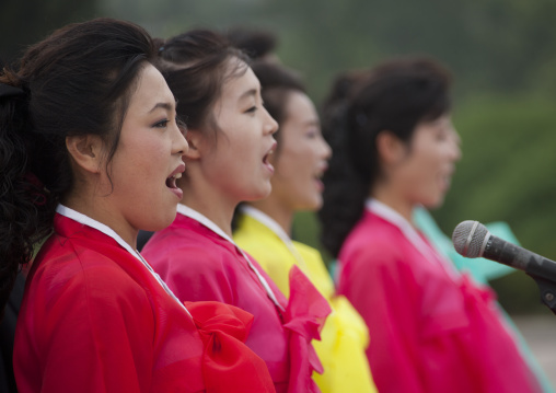 North Korean state artists singing on national day in the street, Pyongan Province, Pyongyang, North Korea