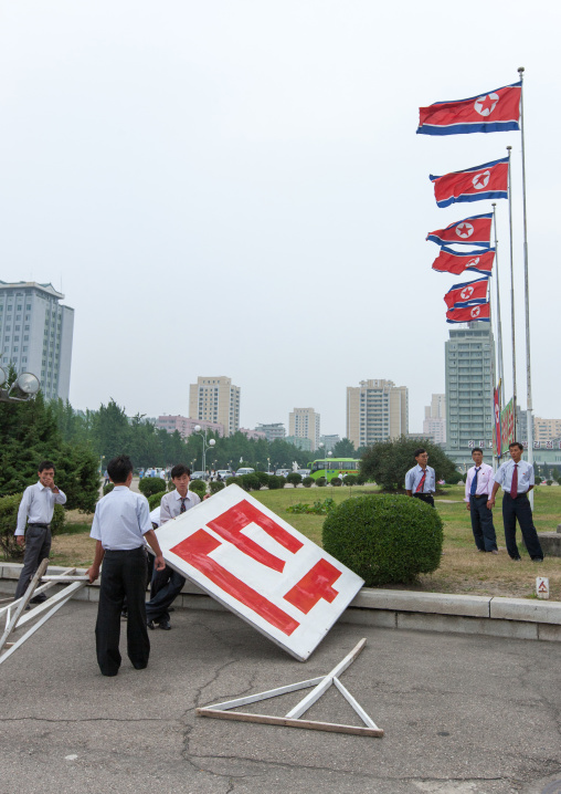 Propaganda billboards during a mass dance performance on september 9 day of the foundation of the republic, Pyongan Province, Pyongyang, North Korea