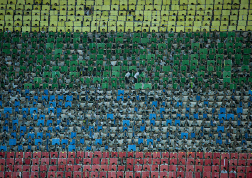 Children used to make human pixels by holding up colored boards during Arirang mass games in may day stadium, Pyongan Province, Pyongyang, North Korea