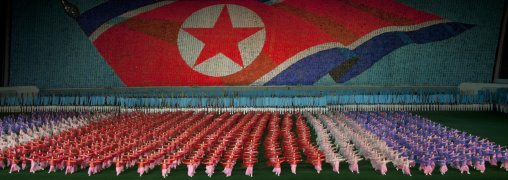 North Korean flag made by human pixels holding up colored boards during Arirang mass games in may day stadium, Pyongan Province, Pyongyang, North Korea
