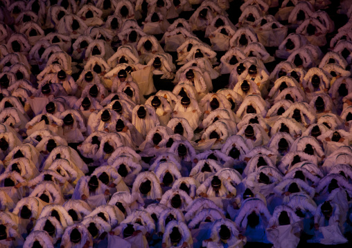 North Korean women dancing in choson-ot during the Arirang mass games in may day stadium, Pyongan Province, Pyongyang, North Korea