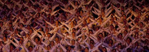 North Korean women dancing in choson-ot during the Arirang mass games in may day stadium, Pyongan Province, Pyongyang, North Korea