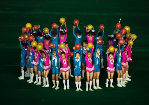 North Korean children performing with balloons during the Arirang mass games in may day stadium, Pyongan Province, Pyongyang, North Korea