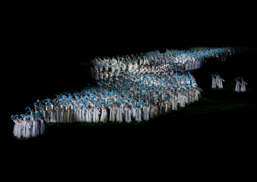 Group of North Korean women making the shape of the Korea map during the Arirang mass games in may day stadium, Pyongan Province, Pyongyang, North Korea
