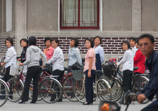 North Korean women going to work with bicycles, North Hwanghae Province, Kaesong, North Korea