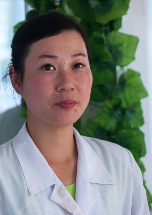 North Korean hairdresser, South Pyongan Province, Chonsam Cooperative Farm, North Korea