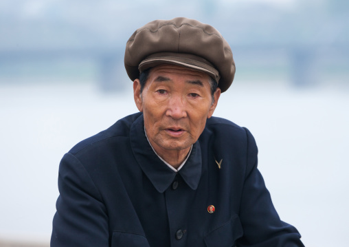 Portrait of senior North Korean man with a cap, Pyongan Province, Pyongyang, North Korea