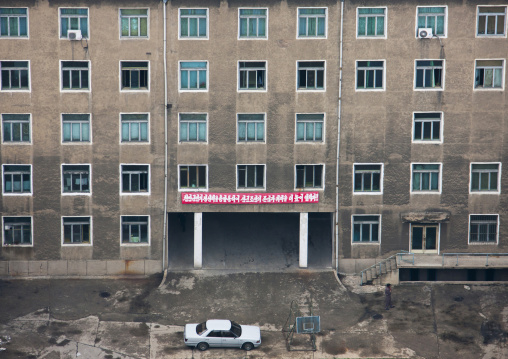 High angle view of buildings in the city center with a car parket at the entrnace, Pyongan Province, Pyongyang, North Korea