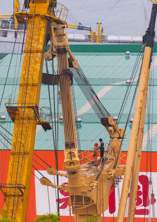 Cranes on the harbour, South Pyongan Province, Nampo, North Korea