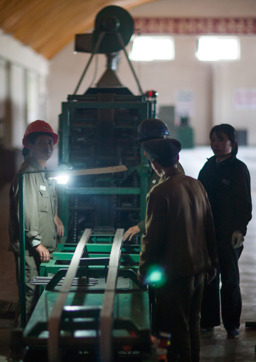 North Korean workers in a steel factory, South Pyongan Province, Nampo, North Korea