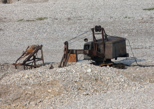 Old rusty digger in a dry river, Pyongan Province, Myohyang-san, North Korea
