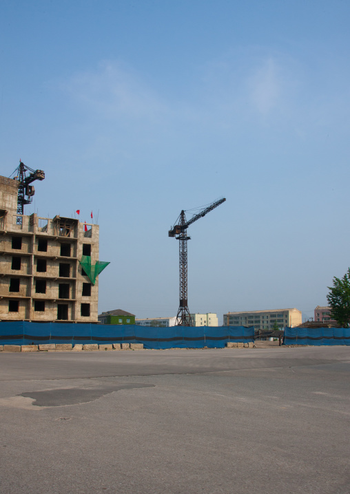 Crane on a building site construction, North Hwanghae Province, Kaesong, North Korea