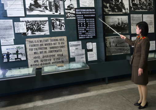 North Korean guide called miss Kim in the victorious fatherland liberation war museum, Pyongan Province, Pyongyang, North Korea