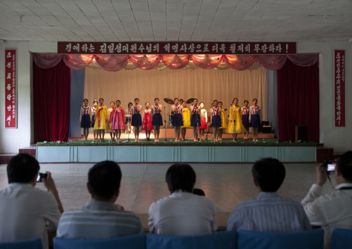 North Korean girl singing during a show for toursist in a school, Pyongan Province, Pyongyang, North Korea