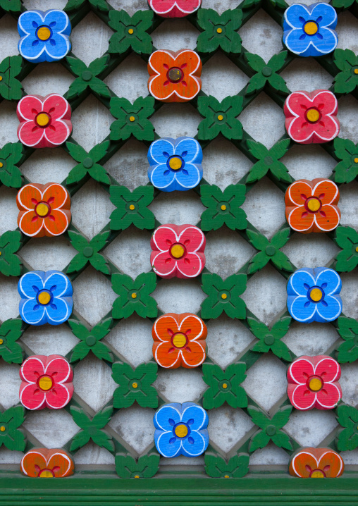 Detail of a colorful flowers on the door of Kwangbok temple, Pyongan Province, Pyongyang, North Korea