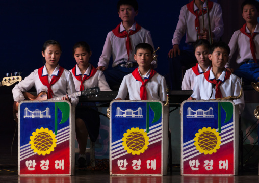 North horean pioneers singing during a show at Mangyongdae children's palace, Pyongan Province, Pyongyang, North Korea