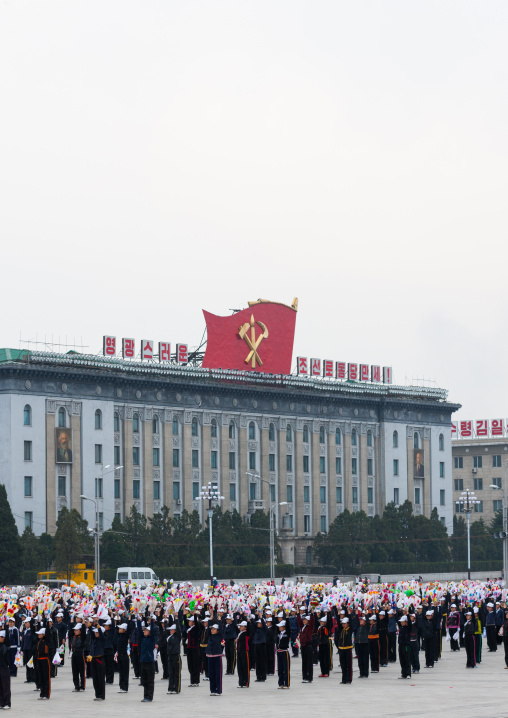 Young North Korean women during a mass games rehearsal in Kim il Sung square, Pyongan Province, Pyongyang, North Korea