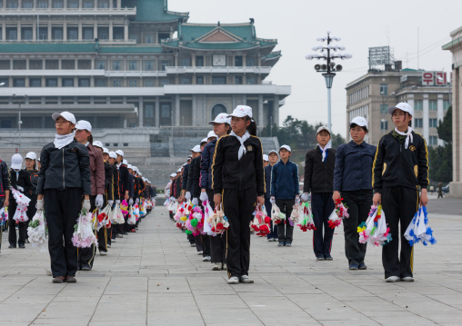 Young North Korean women during a mass games rehearsal in Kim il Sung square, Pyongan Province, Pyongyang, North Korea