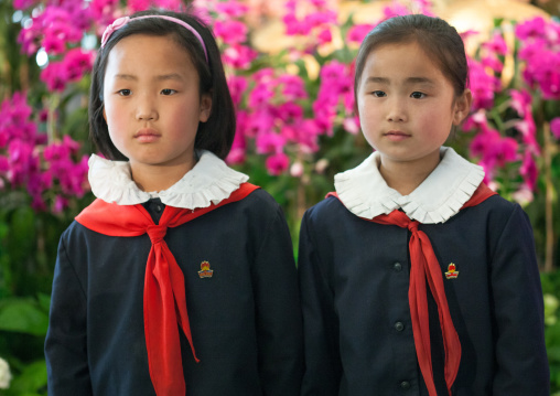 North Korean pioneers girls in the international Kimilsungia and Kimjongilia festival, Pyongan Province, Pyongyang, North Korea
