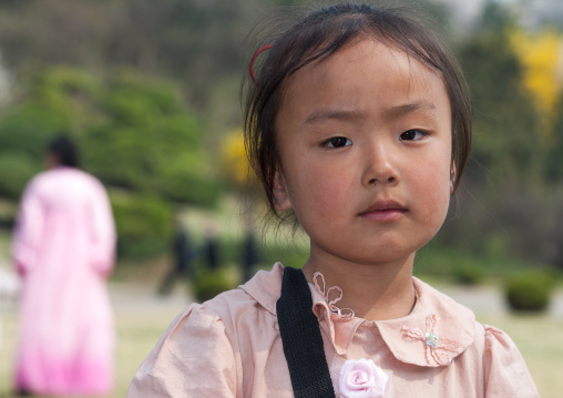 Portrait of a North Korean girl in a park, Pyongan Province, Pyongyang, North Korea