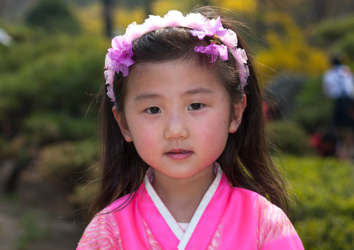 Portrait of a North Korean girl with flowers in the hair, Pyongan Province, Pyongyang, North Korea