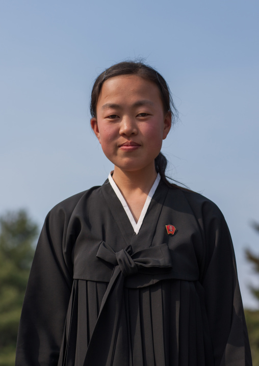 Portrait of a North Korean teenage girl in traditional choson-ot, Pyongan Province, Pyongyang, North Korea