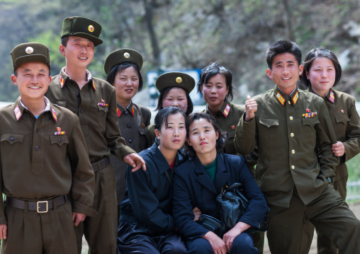 North Korean soldiers posing for a picture with women, Kangwon Province, Wonsan, North Korea