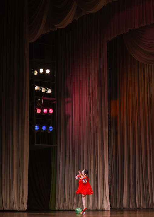 North Korean acrobat girl with a pottery on the stage of Mangyongdae children's palace, Pyongan Province, Pyongyang, North Korea