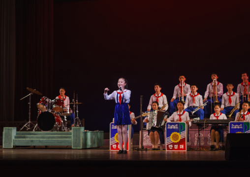 North horean pioneers singing during a show at Mangyongdae children's palace, Pyongan Province, Pyongyang, North Korea