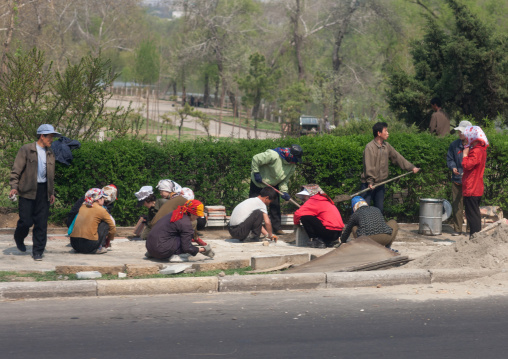North Korean people repairing pavement during collective works, Pyongan Province, Pyongyang, North Korea