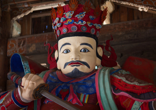 Colorful statue of jeungjang-cheonwang heavenly king of the south at the Pohyon-sa Korean buddhist temple, Hyangsan county, Mount Myohyang, North Korea