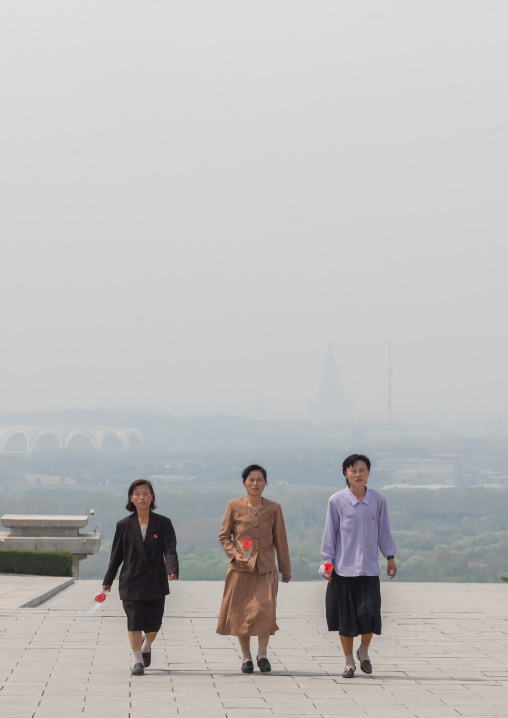 North Korean women going to Taesongsan revolutionary martyr's cemetery, Pyongan Province, Pyongyang, North Korea
