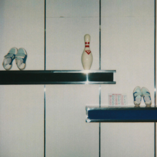 Polaroid of shoes displayed in a bowling, Pyongan Province, Pyongyang, North Korea