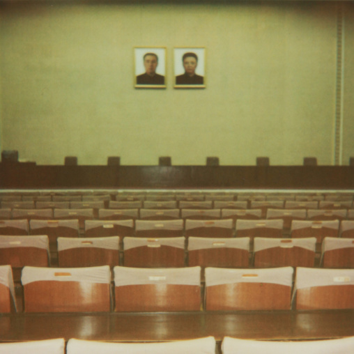 Polaroid of the Dear Leaders portraits in a meeting room, Pyongan Province, Pyongyang, North Korea