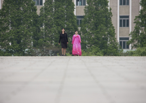 North Korean women walking in the street, Pyongan Province, Pyongyang, North Korea